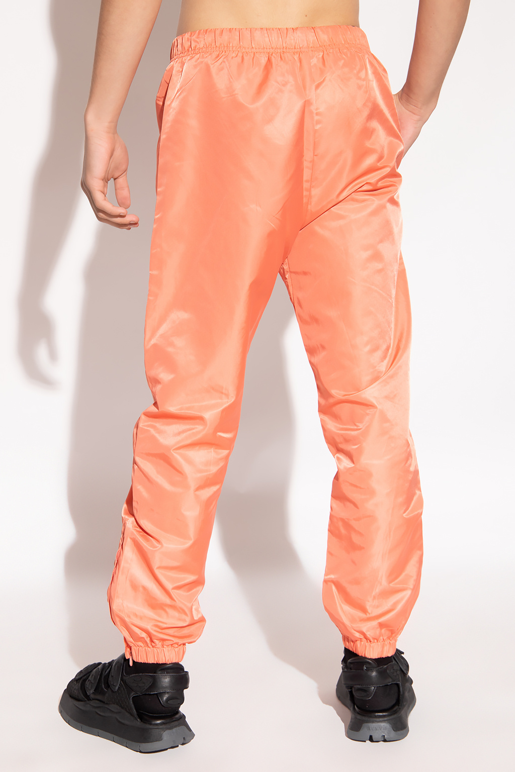 Orange Track pants with logo Fear Of God Essentials - Vitkac Canada